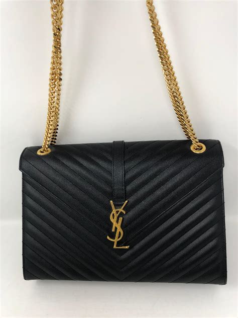 black ysl bag with silver chain|ysl black and gold bag.